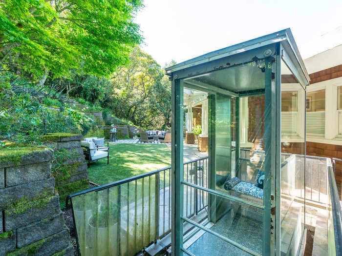 "It was constructed of all glass walls to catch the beauty of the Bay Views and the drama of descending to the gorgeous home below and offered a bench seat with cushion as well.  It truly was a vision," Scremin said of this funicular.