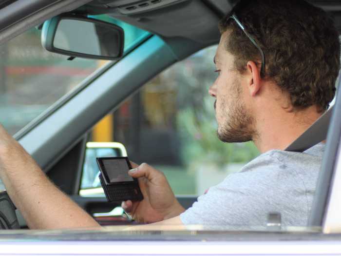 Young motorists are more likely to be on their phones while driving.