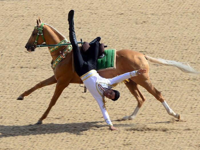 Turkmenistan was largely made up of nomadic tribes when it got its independence, and the country continues to revere horses. It has a national holiday in honor of them and horses and riders perform daring tricks in year-round shows across the country, as below.