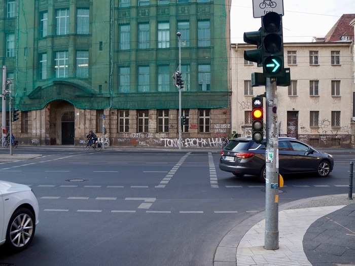 Bikers get their own special lights at busy intersections. See the smaller set of traffic lights below.