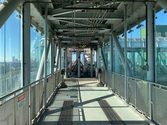 The walkways are lined with sturdy guardrails. At each intersection, you can see some of the equipment used to control the "digestion" process.