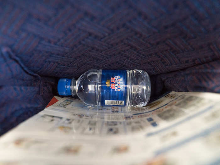 When I got to my seat, I was grateful to find a small bottle of water tucked inside the airplane pocket in front of me — I was exhausted after running to the gate.