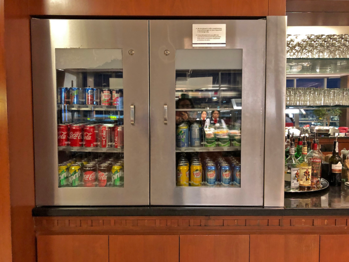 On one side of the buffet, there was a fully-stocked refrigerator with different soft drink options ...