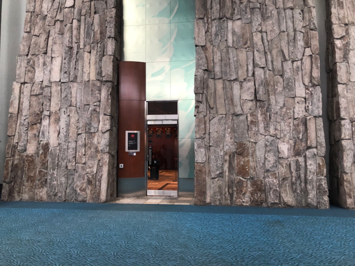 The Maple Leaf lounge I visited in Vancouver is nestled inside a fake rock wall in the domestic terminal.