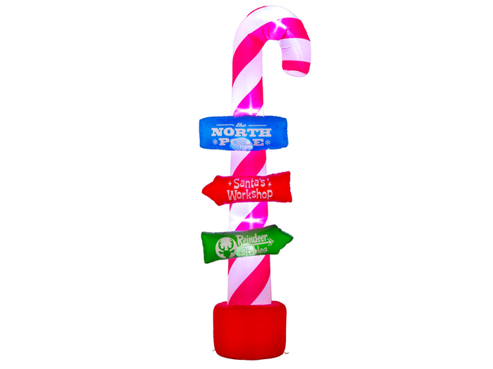 A decked-out candy cane with directions to the North Pole