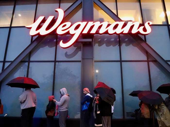 Despite the rain, Wegmans fanatics did not waver in their devotion.