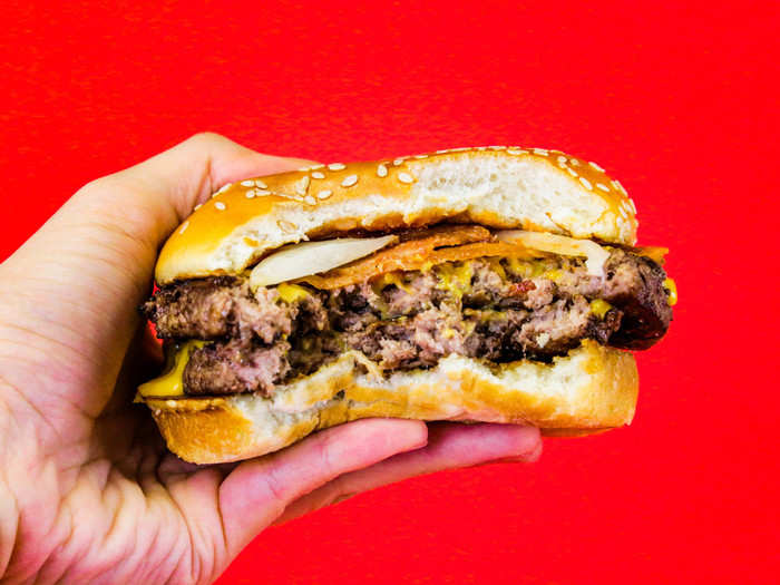 The sesame-seed bun and the addition of bacon also distinguished this burger from its smaller sibling.