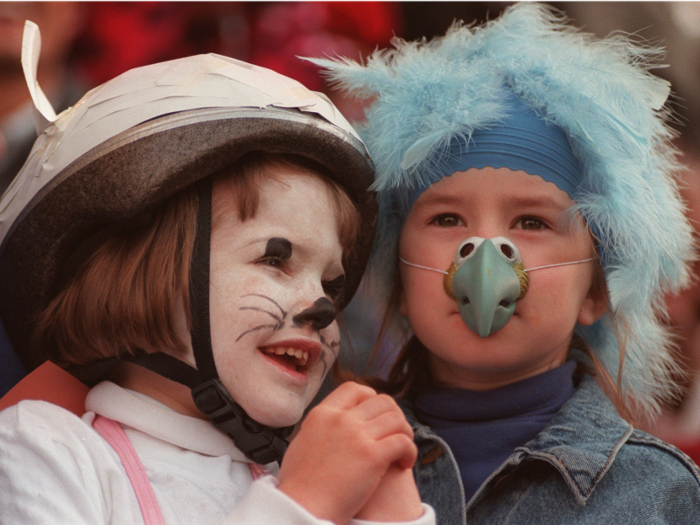 (1995) New York City trick-or-treaters watching the "Skatefright Masquerade" Halloween party in Central Park.