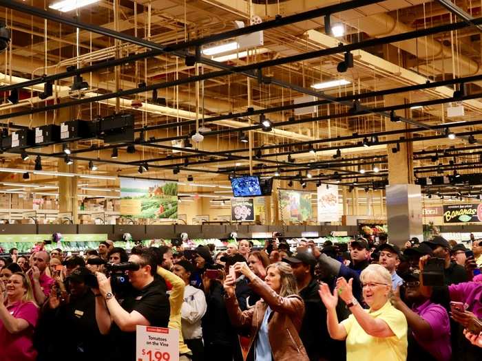 Inside, hordes of employees prepared to welcome customers into the store for the very first time.