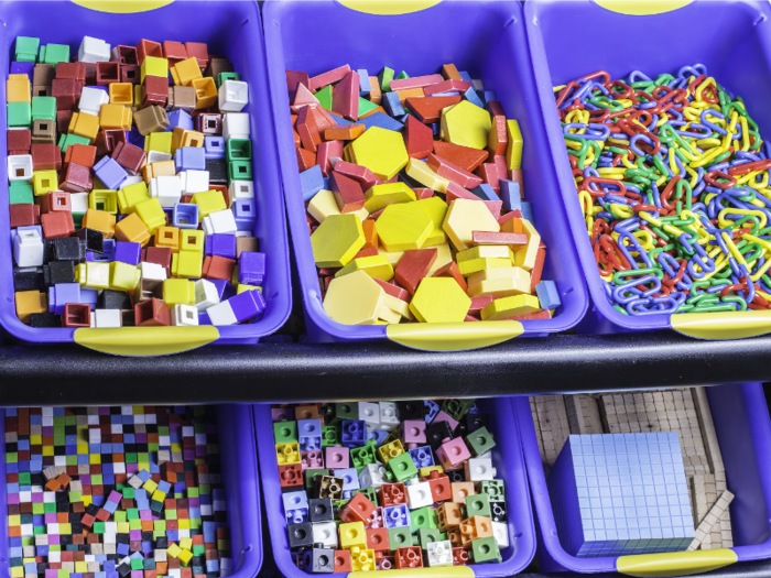 Classroom organizers like paper baskets, folders, and bins are not typically provided to teachers, so they have to purchase them themselves.