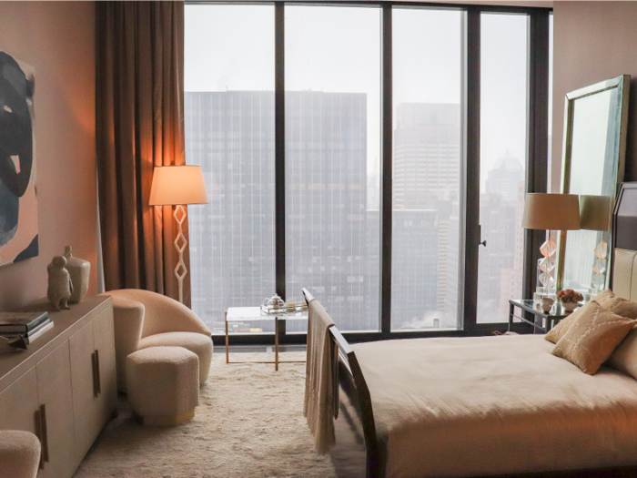 Each bedroom has floor-to-ceiling windows for optimal city views.