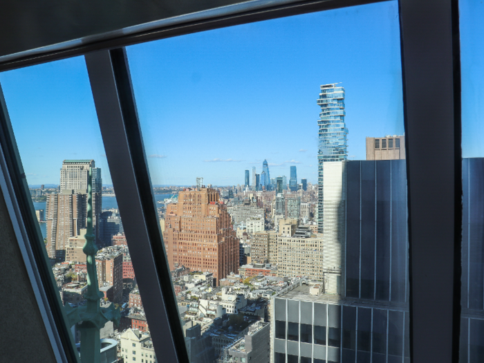 Windows installed in the facade offer views uptown. The cluster of brand-new skyscrapers at Hudson Yards can be seen in the distance.