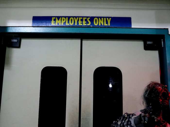 We found another zombie behind the doors of an area labeled "Employees Only."