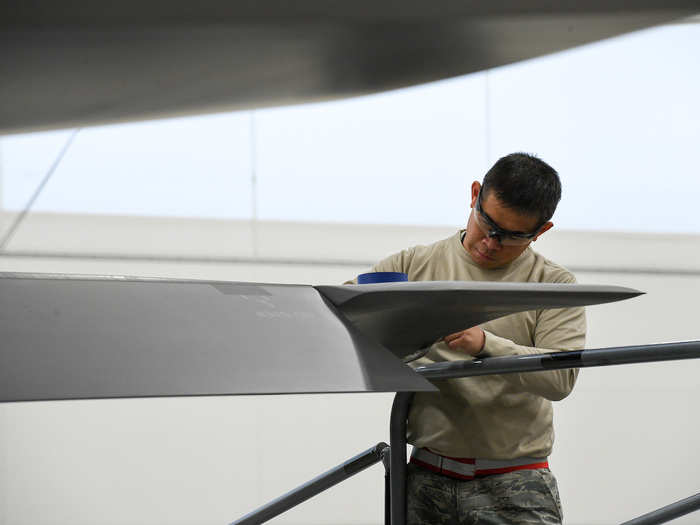 The fabrication flight team inspects and evaluates the jets