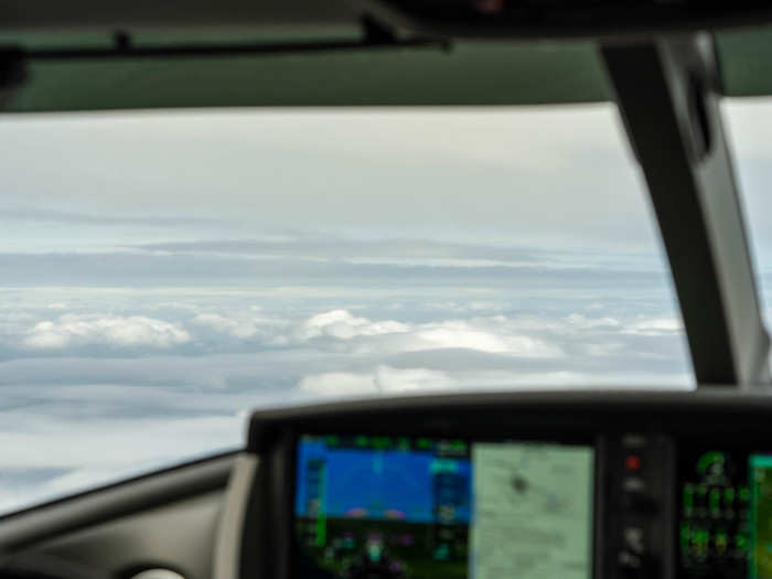 A few minutes later, we broke above the clouds. Autopilot was active by this point, flying the plane based on the pilots instructions and inputs.