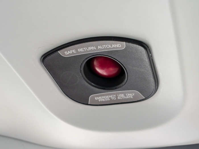 The Safe Return button is located on the ceiling in between the pilot and the first row of seats. If something happened to the pilot — like a medical emergency, the passengers can see right away and reach the button.