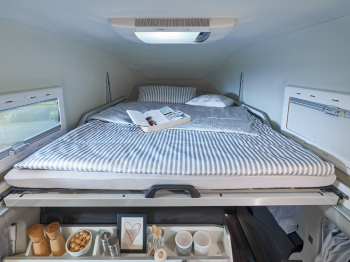 It can sleep up to four people with its two double beds: one that folds out into the roof space, and one in the living area.