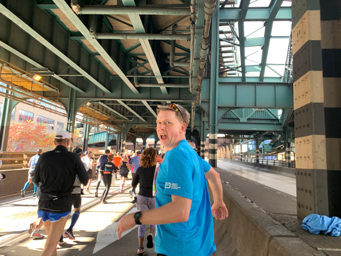 Before we knew it, we were on our third bridge of the day. The Queensboro Bridge brought us into Manhattan. We were told that the Verrazano Bridge was the highest elevation gain of the day, but by mile 15, the ascent up the Queensboro Bridge felt way more intense. The benefit: Running downhill into cheering crowds off 59th street.