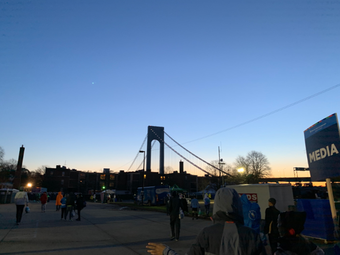 By then, the sun had just started to peek out on the horizon behind the bridge we weren