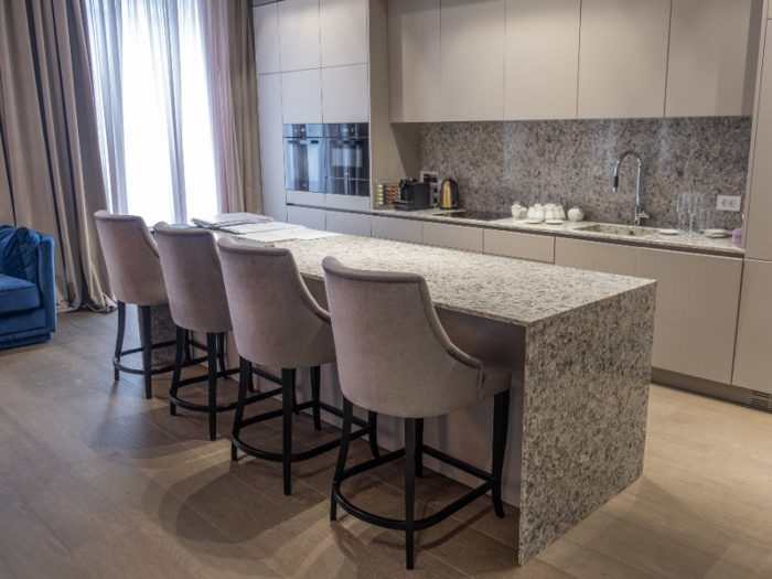 The kitchen was set up with a coffee machine, coffee cups, and Champagne glasses.