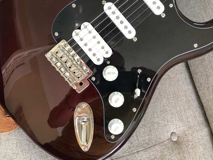 The familiar three-knob, five-way-pickup-selector setup. For this HSS Strat the single-coil bridge pickup has been exchanged for a beefier humbucker.