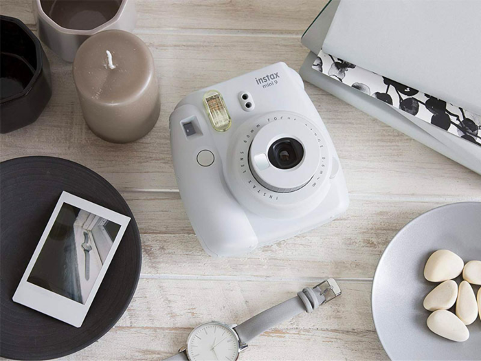 A light and portable instant camera