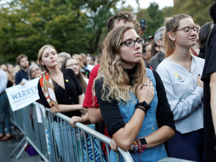 There were emotional moments in both rallies. Here, a woman has her hand on her heart.