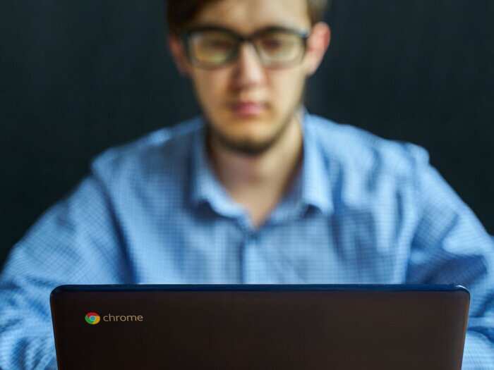 How to change your background on a Chromebook, using its default photos