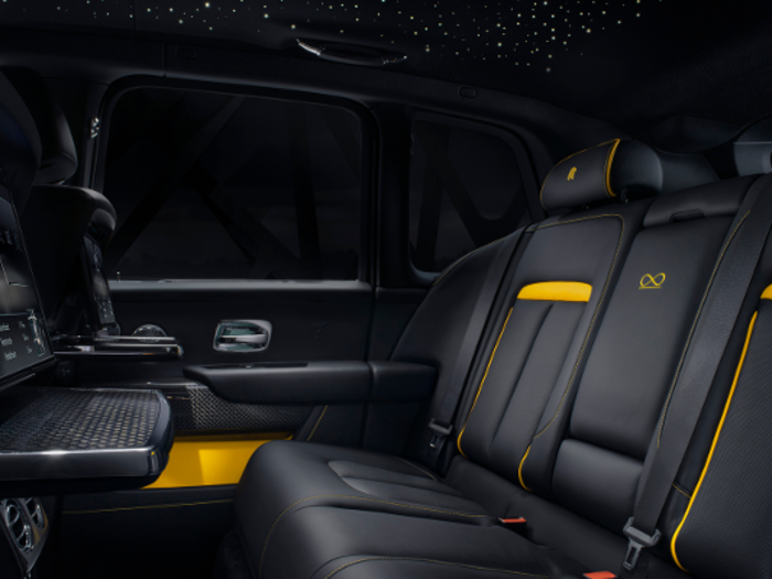 The interior is fitted with Forge Yellow-trimmed leather that contrasts the black.