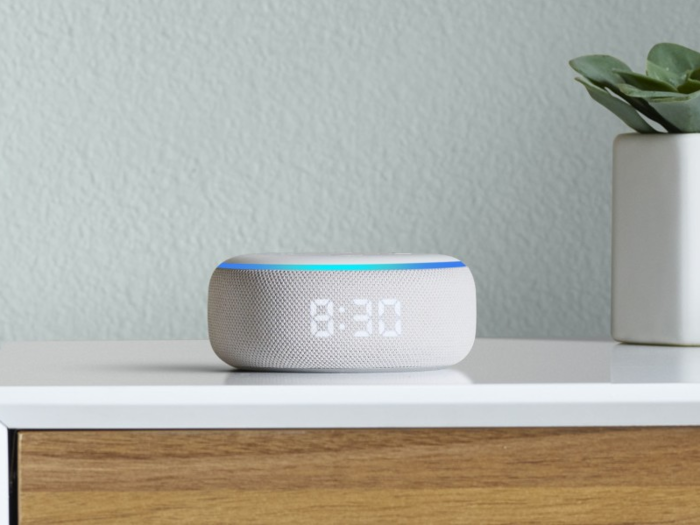 An Echo Dot with a clock