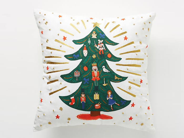 A cheerful holiday throw pillow