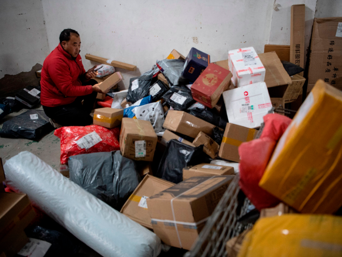 Workers in chaotic-looking warehouses appear to be struggling to keep up with the large number of Singles