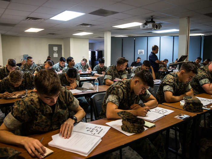 The first day, students are in a classroom environment where they learn the basic information of a JLTV.