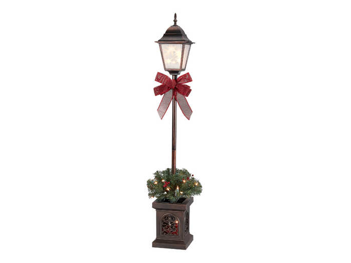 A festive lamp post planter