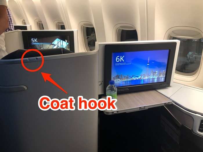 I settled in and hung my jacket on a coat hook in front of me, and a flight attendant quickly swooped by and offered to check it for me. Who knew there was a coat check on a plane?