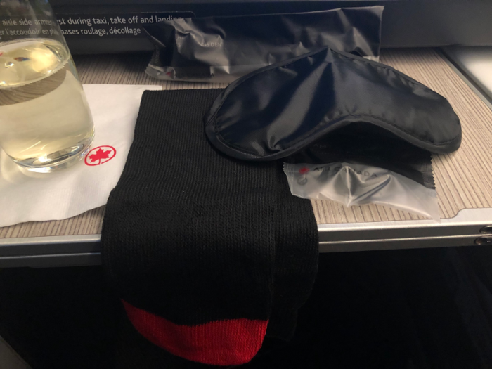 The kit had a package of earplugs as well as an eye mask for sleeping and socks so that I could take off my shoes.