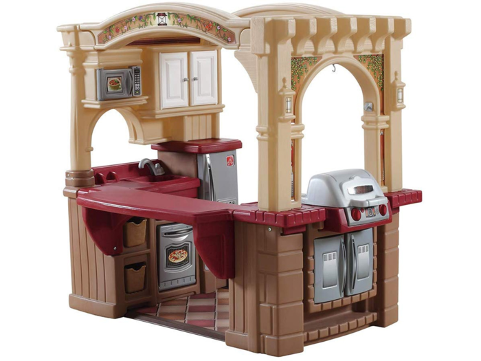 A play kitchen with all the bells and whistles