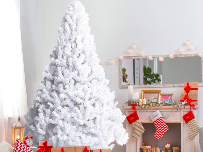 An 8-foot Spruce tree with sturdy metal legs and plastic pads to protect your floor