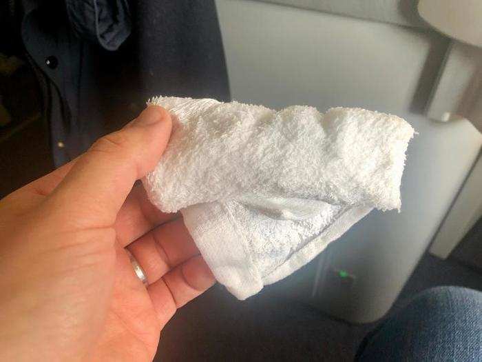 A few minutes after takeoff, the flight attendants came through the cabin with hot towels.