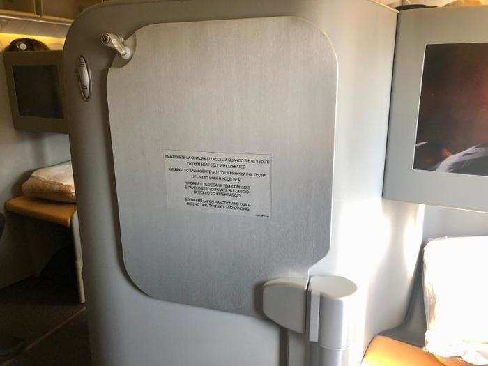 The tray table swiveled and folded up, staying unobtrusively out of the way when you don