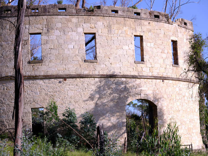 The 75-foot-tall Rotunda, introduced with a formal ball in 1877, was once a highlight of the property. Only the shell has survived multiple fires.