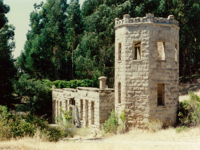 The resort has never been renovated, and the remaining shells of the stone buildings are all that