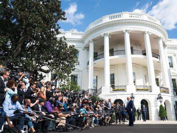 October 4: Trump talks to reporters gathered outside the White House as he gets ready to leave on Marine One.