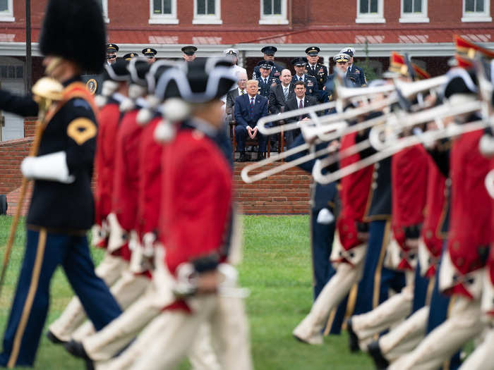 September 30: Trump watches a military band at a ceremony in honor of the 20th Chairman of the Joint Chiefs of Staff.