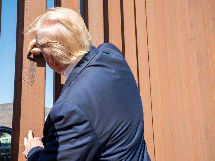 September 18: Trump signs a section of the fence that separates the US from Mexico.