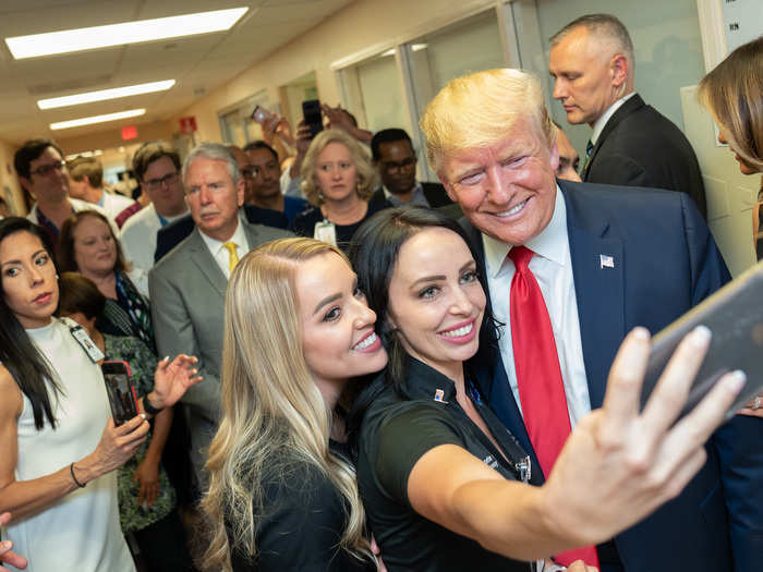 August 7: Trump stops for a selfie with two supporters in El Paso, Texas.