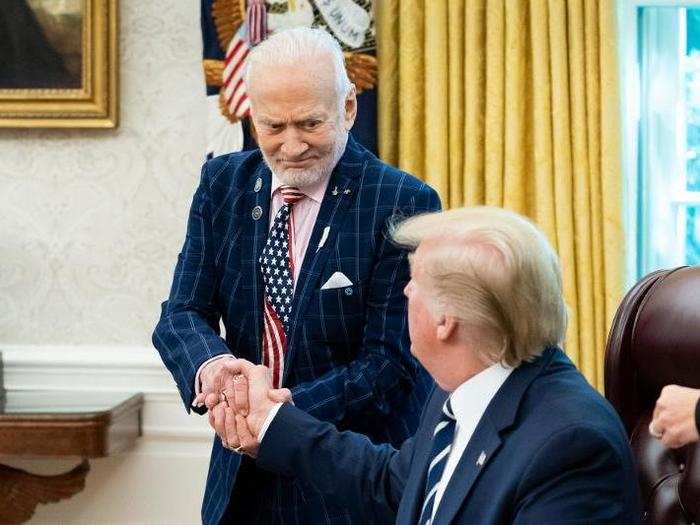 July 19: Trump shakes the hand of astronaut Buzz Aldrin during a ceremony to mark the 50th anniversary of the Apollo 11 moon landing in the Oval Office.