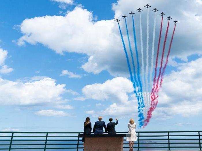 June 6: The Trump view a flyover at the Normandy American Cemetery with French President Emmanuel Macron and his wife Brigitte.