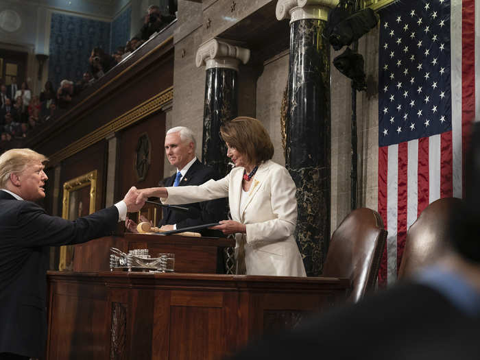 February 5: Trump shakes the hand of the newly re-elected Speaker of the House Nancy Pelosi before giving his State of the Union speech.