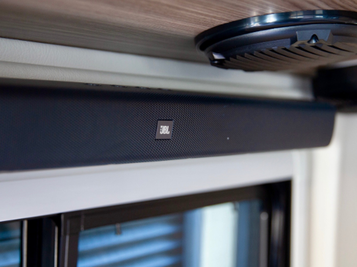 A JBL Soundbar serves as the speaker for the van.